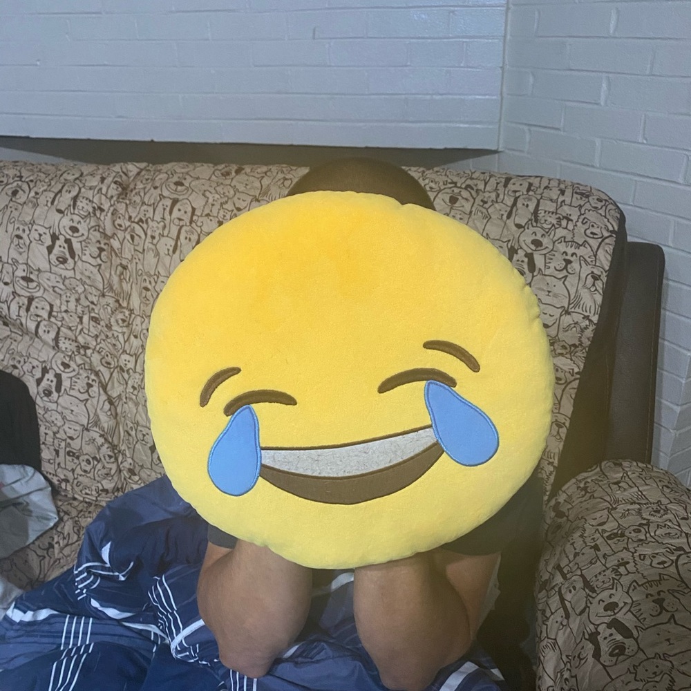 Laughing emoji pillow